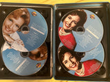 Betty White 4 disc DVD collection and a tin case - used